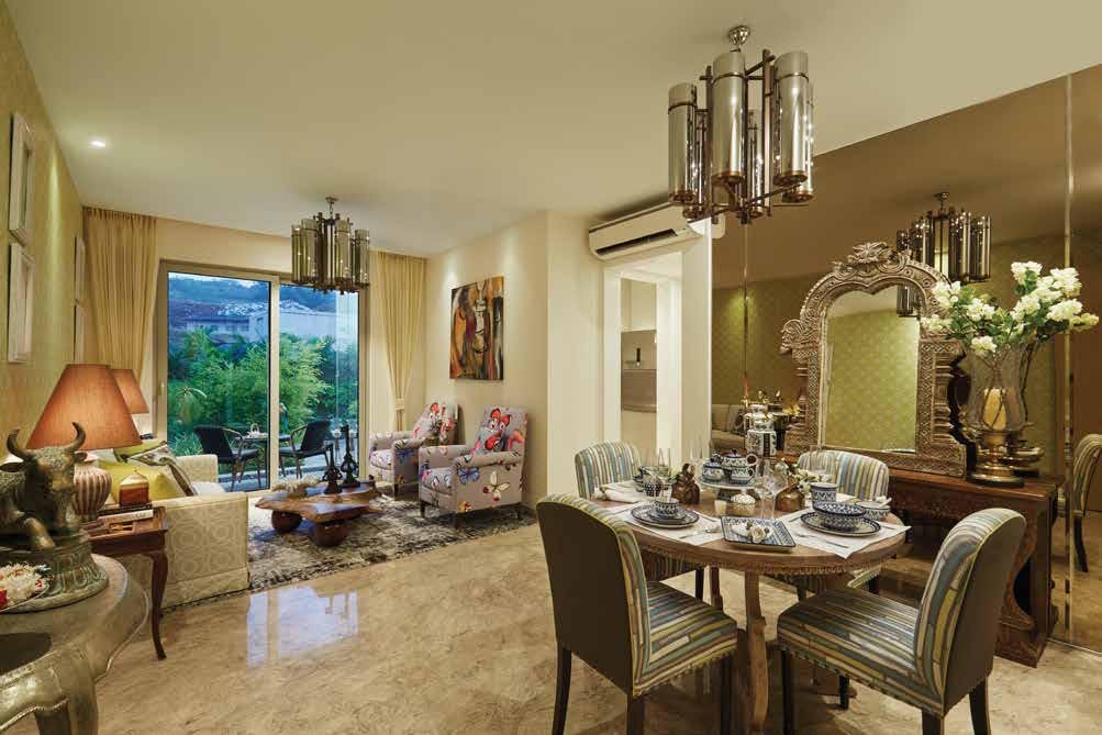 Hiranandani Panvel township with landscaped gardens, green spaces, and modern towers against the Sahyadri backdrop